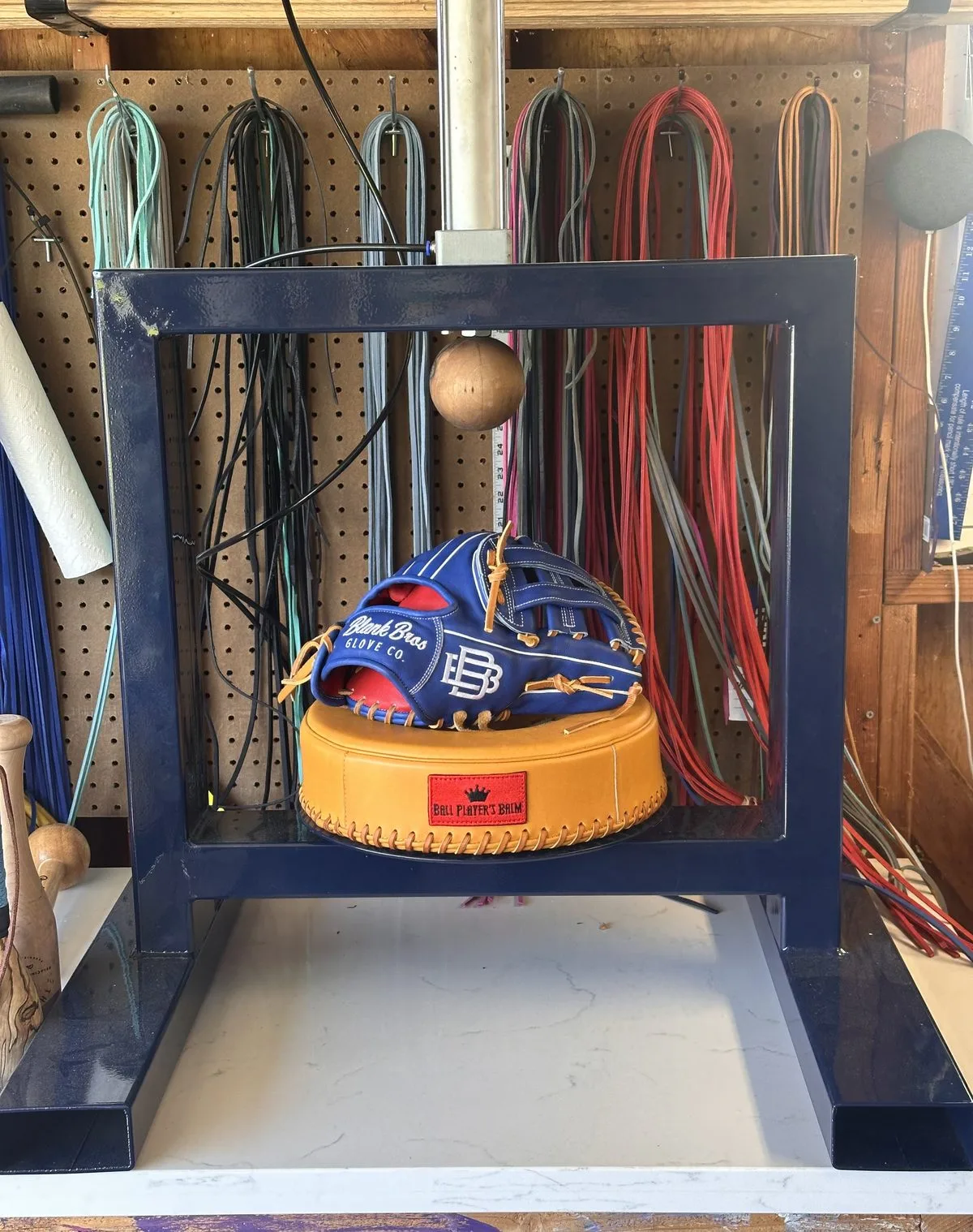 Blank Bros custom-built glove break-in machine