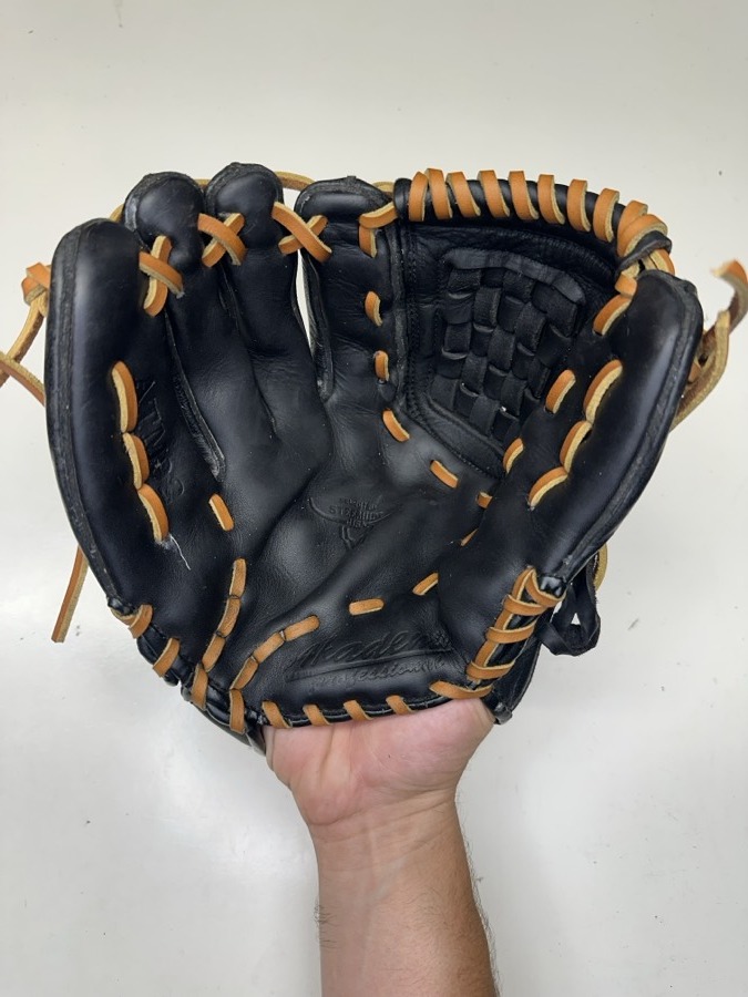 Akadema baseball glove after restoration by Blank Bros Glove Co. — cleaned, conditioned, and relaced