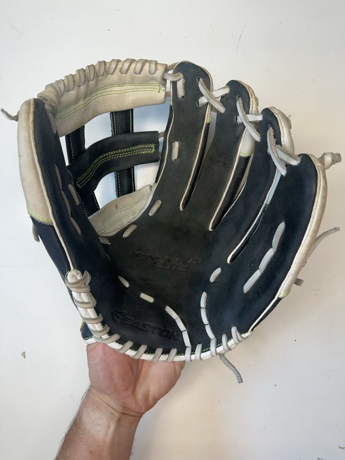 Easton baseball glove before restoration — worn leather and frayed laces