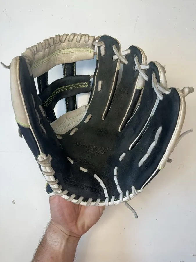 Easton baseball glove before restoration — worn leather and frayed laces