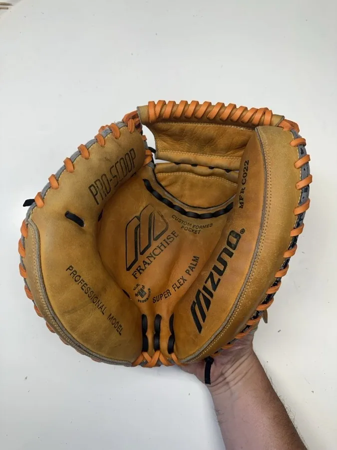 Mizuno baseball glove after restoration by Blank Bros Glove Co. — cleaned, conditioned, and relaced