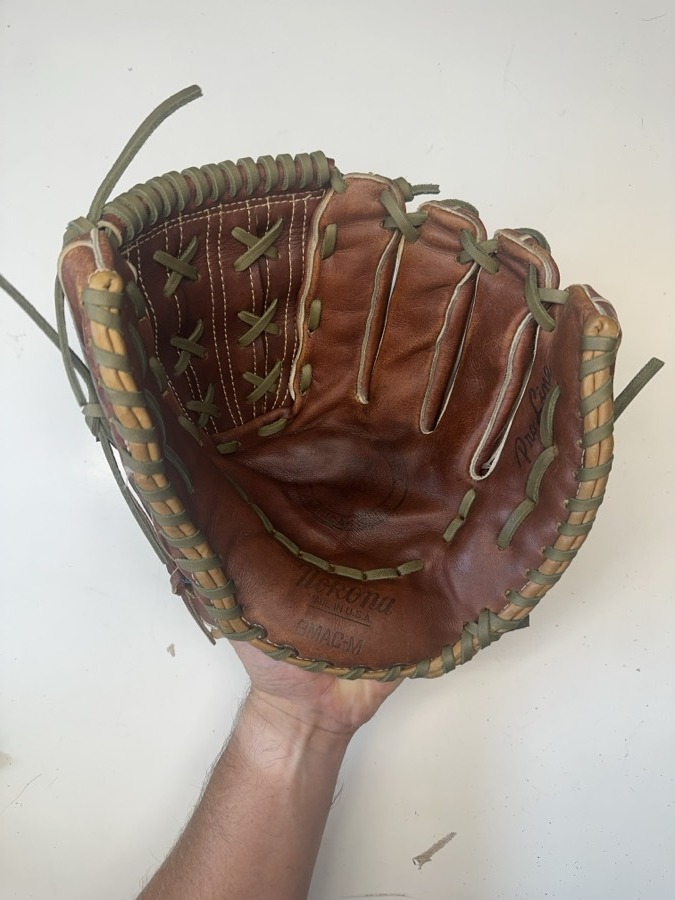 Nokona baseball glove after restoration by Blank Bros Glove Co. — cleaned, conditioned, and relaced