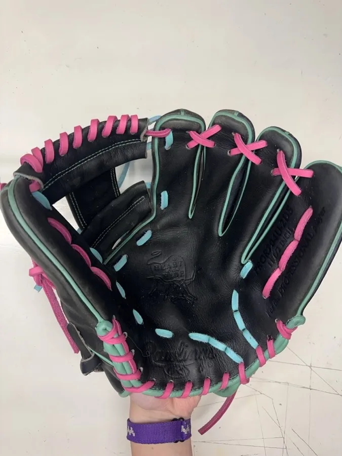 Rawlings baseball glove after restoration by Blank Bros Glove Co. — cleaned, conditioned, and relaced