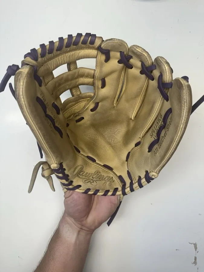 Rawlings baseball glove after restoration by Blank Bros Glove Co. — cleaned, conditioned, and relaced