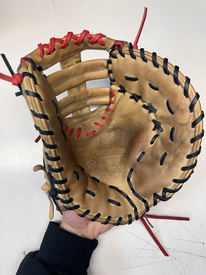 Rawlings baseball glove after restoration by Blank Bros Glove Co. — cleaned, conditioned, and relaced