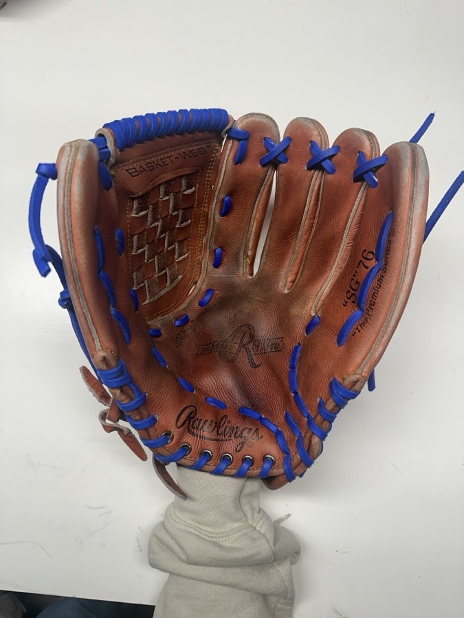 Rawlings baseball glove after restoration by Blank Bros Glove Co. — cleaned, conditioned, and relaced
