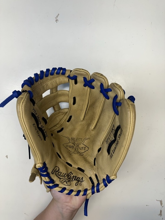 Rawlings baseball glove after restoration by Blank Bros Glove Co. — cleaned, conditioned, and relaced