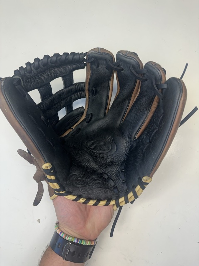 Rawlings baseball glove after restoration by Blank Bros Glove Co. — cleaned, conditioned, and relaced
