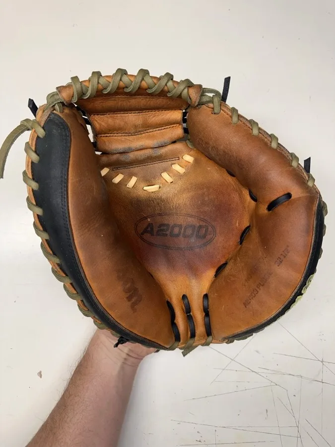 Wilson baseball glove after restoration by Blank Bros Glove Co. — cleaned, conditioned, and relaced