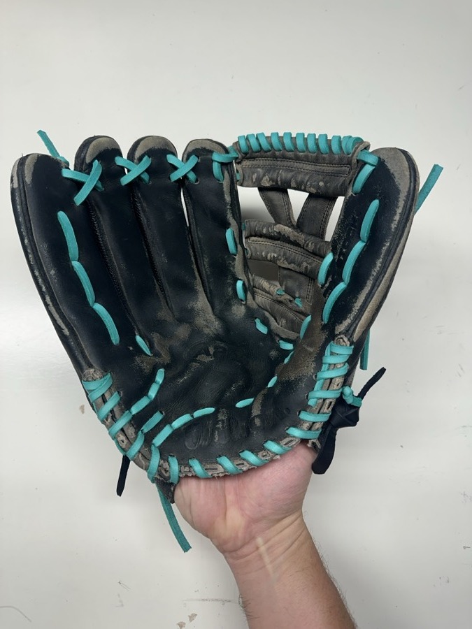Wilson baseball glove after restoration by Blank Bros Glove Co. — cleaned, conditioned, and relaced