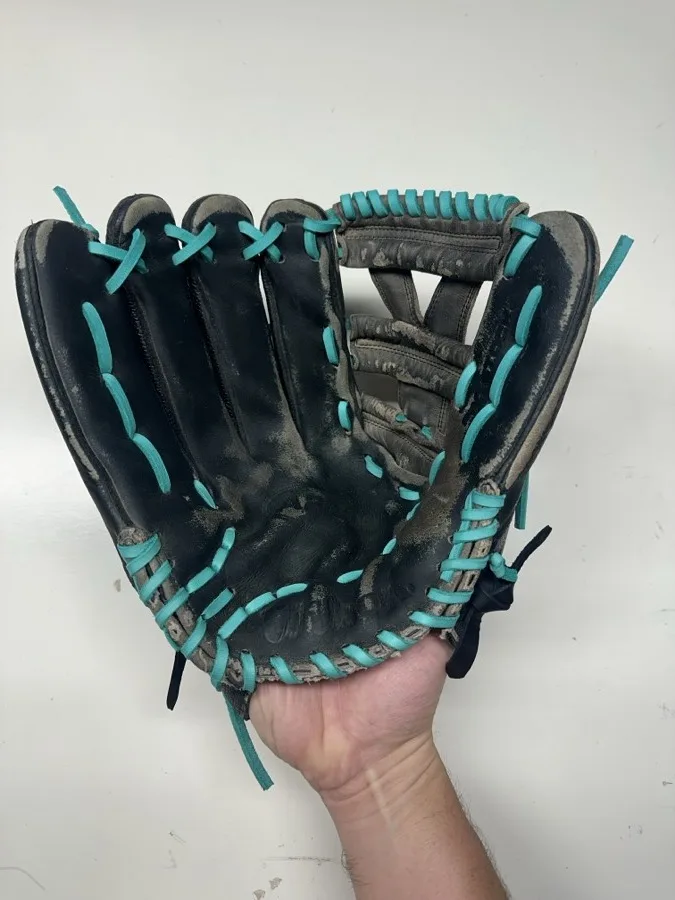 Wilson baseball glove after restoration by Blank Bros Glove Co. — cleaned, conditioned, and relaced